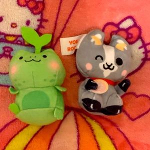 two blind box plushies goat and frog